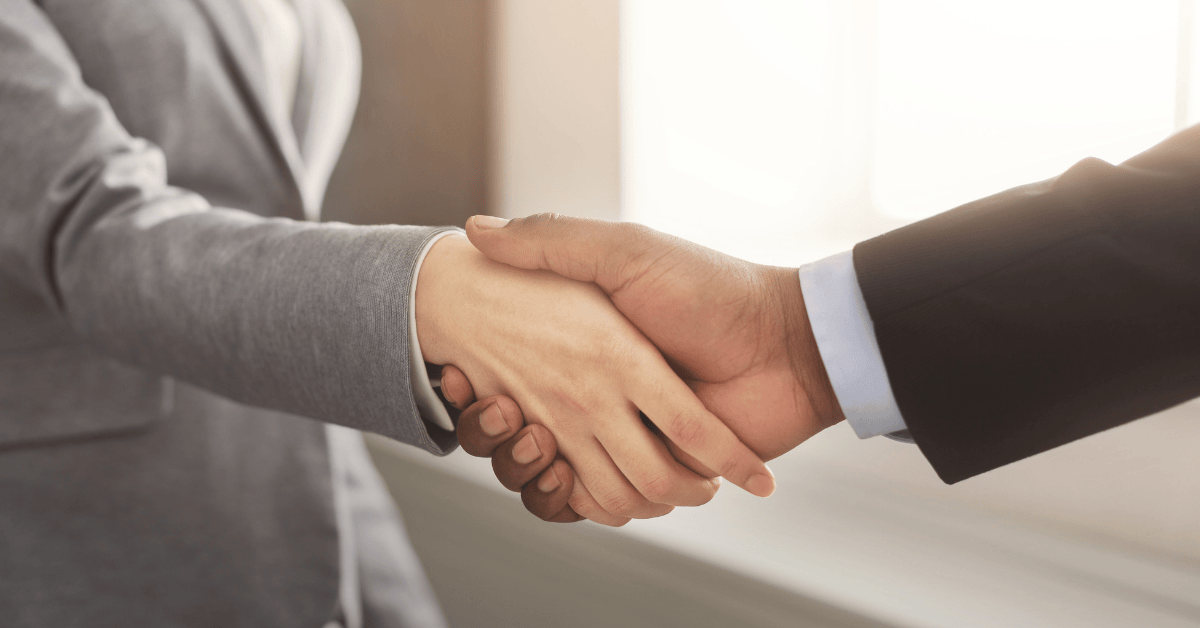 Man and woman shaking hands